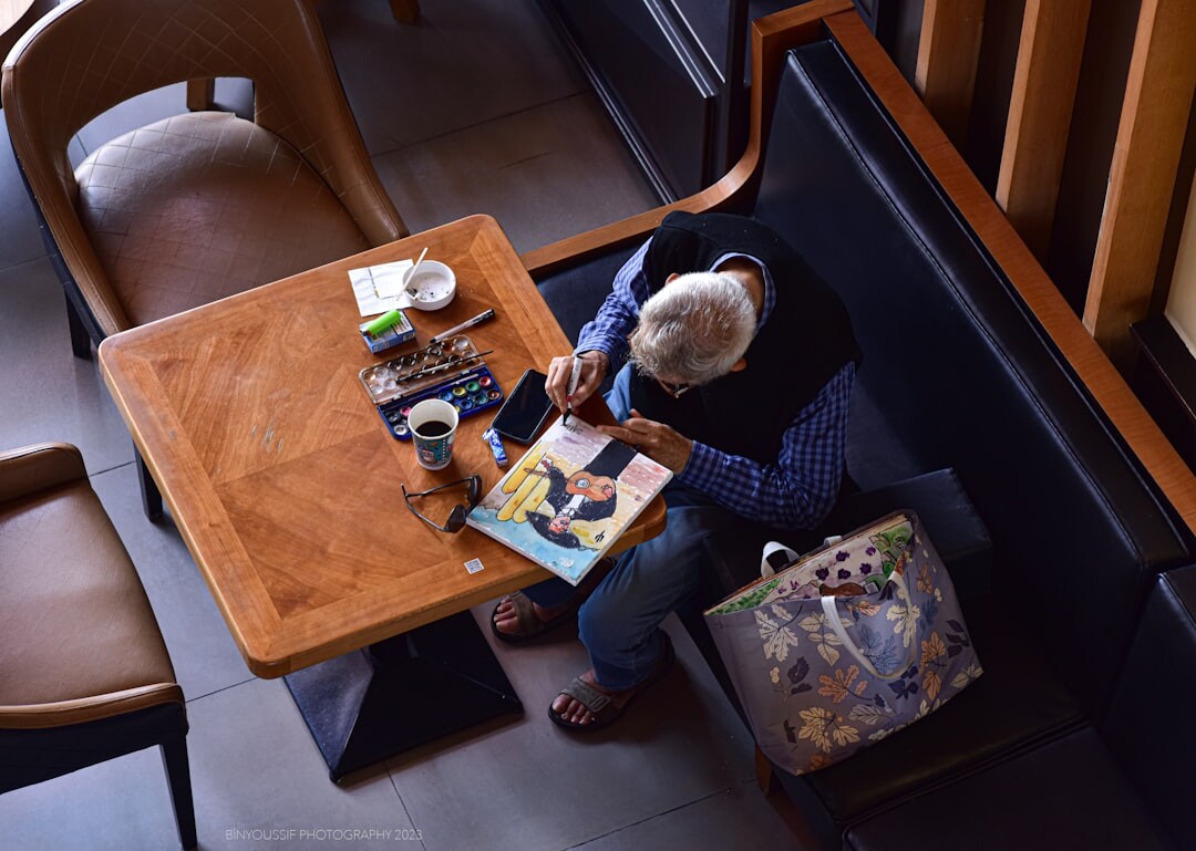 elderly woman painting